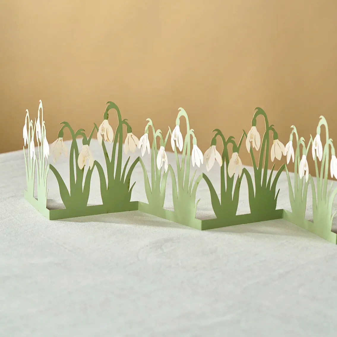 The Newt In Somerset Snowdrop Paper Table Garland, £10.50