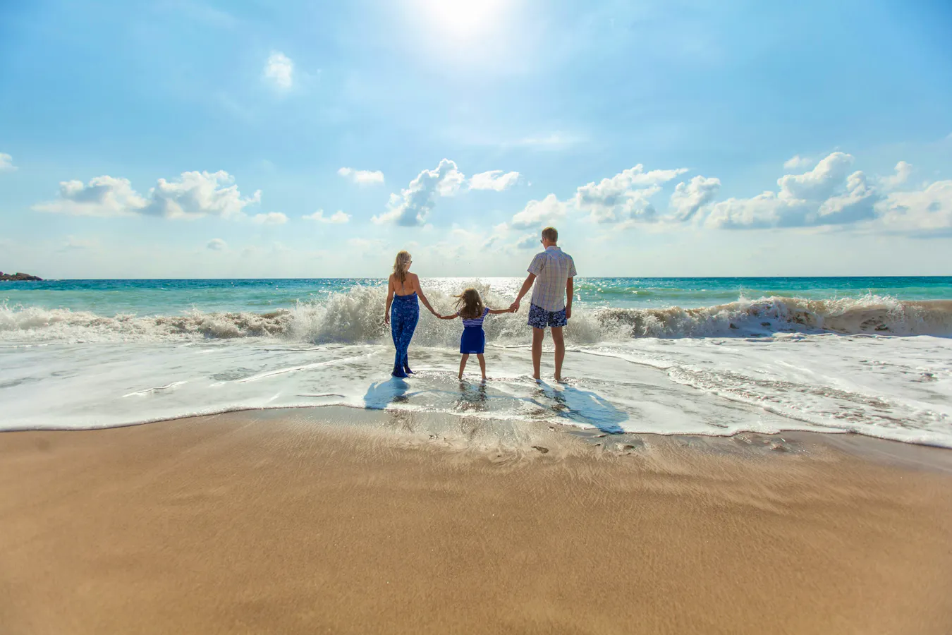 101 Holidays Family On Beach Supplied By Unsplash