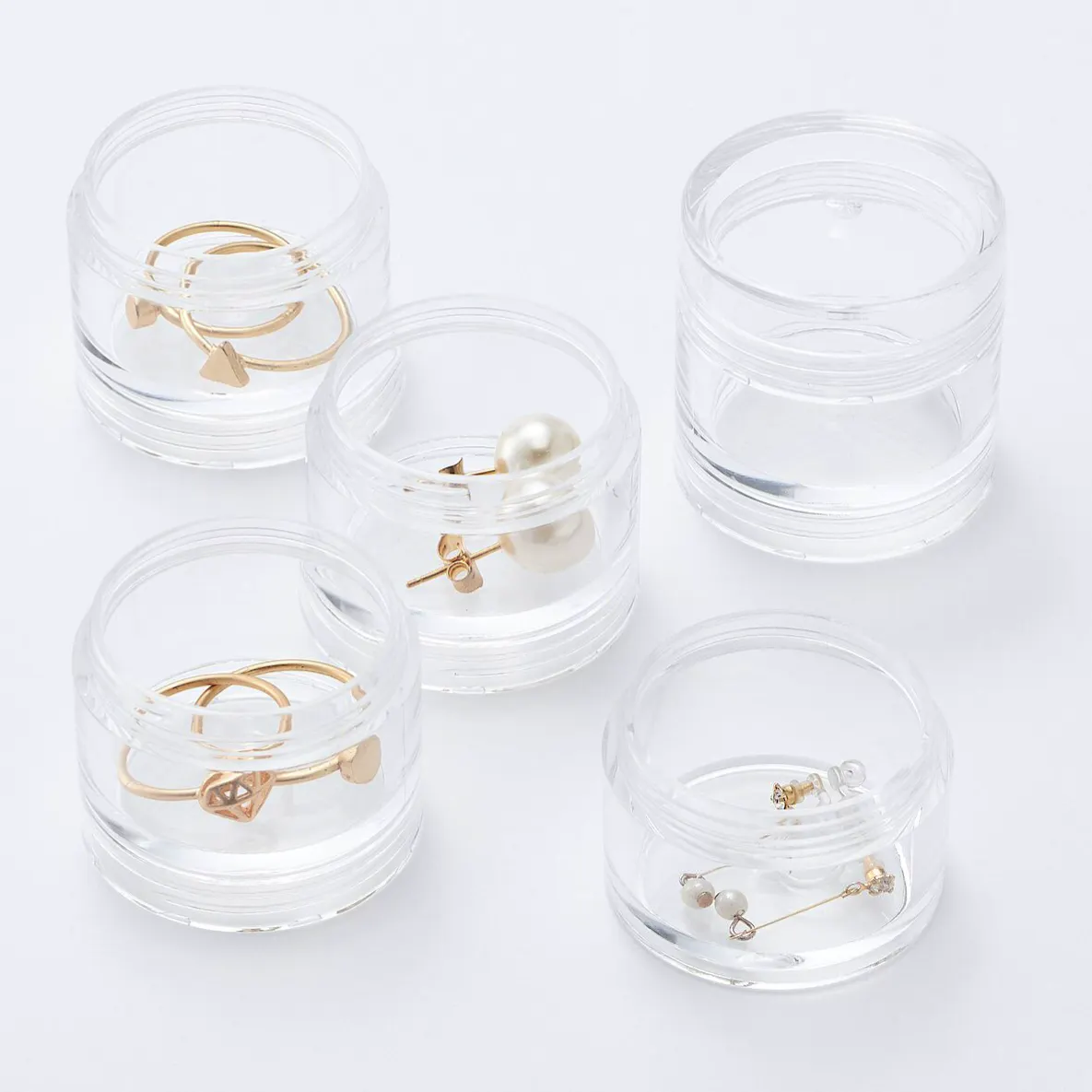 Muji Stacking Travel Cosmetic Pots, £3.75