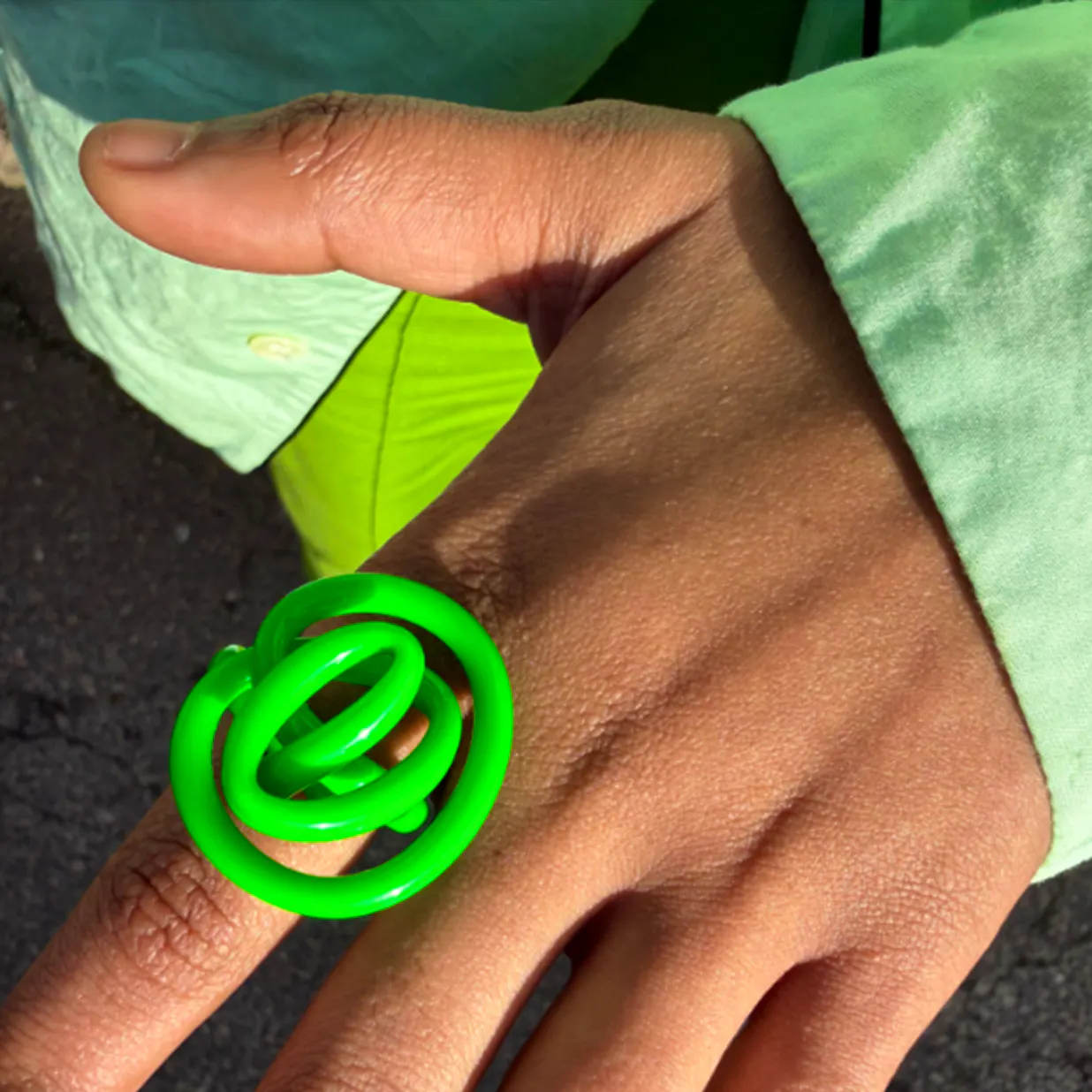 Tomfoolery Brilliant Zig Ring in Neon Green, £20