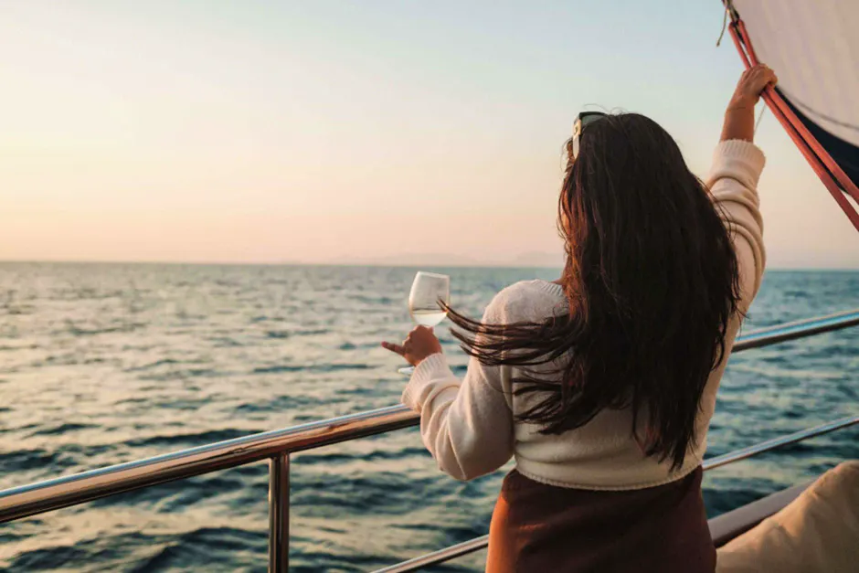 The Travel Choices That Make VIP Trips Feel Effortless Woman On Yacht