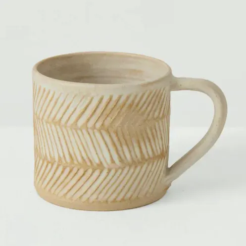 Elke Lucas Carved Mug Cream, £38