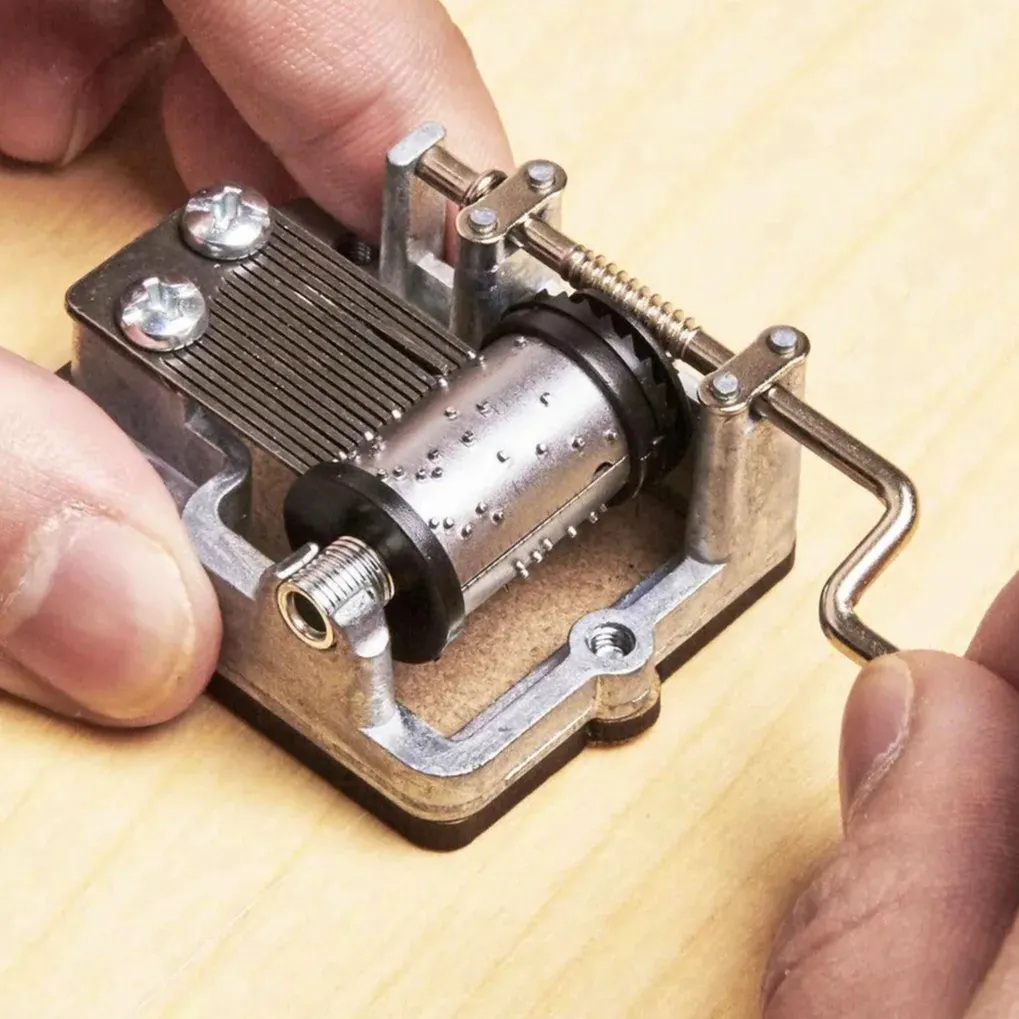 Kikkerland Hand-Crank Music Box, £8.47